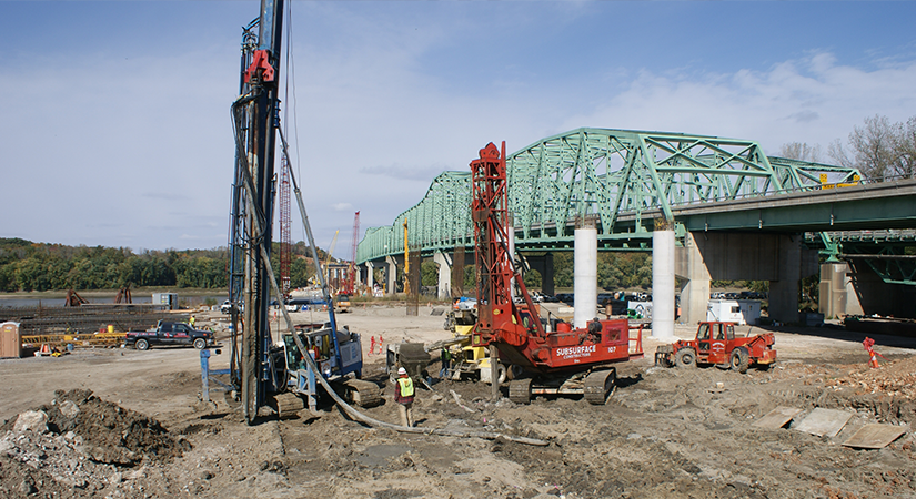 rigid inclusions being installed next to a bridge